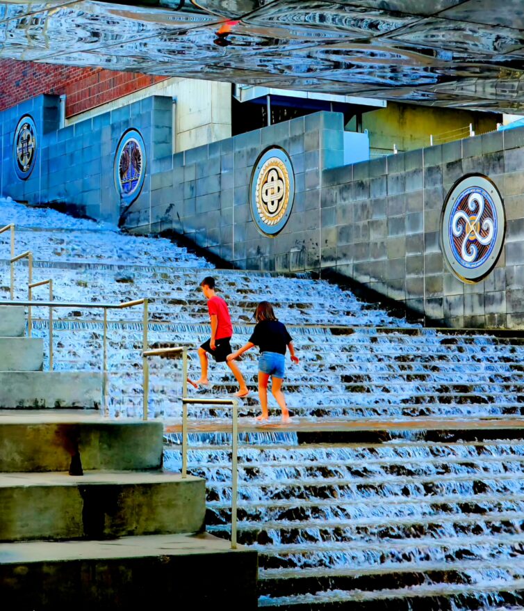 The Passage and Chattanooga Waterfall Steps: What to Know Before You Go 4 Children playing on the cascading Chattanooga waterfall steps at The Passage in Chattanooga, a public art installation and Trail of Tears memorial near the Tennessee Aquarium.