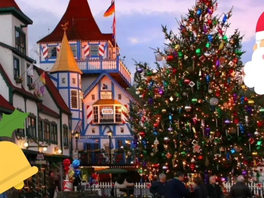 Helen Georgia's Top Attractions For 2025 7 Downtown Helen GA street with festive lamppost wreaths and illuminated Alpine buildings at night.