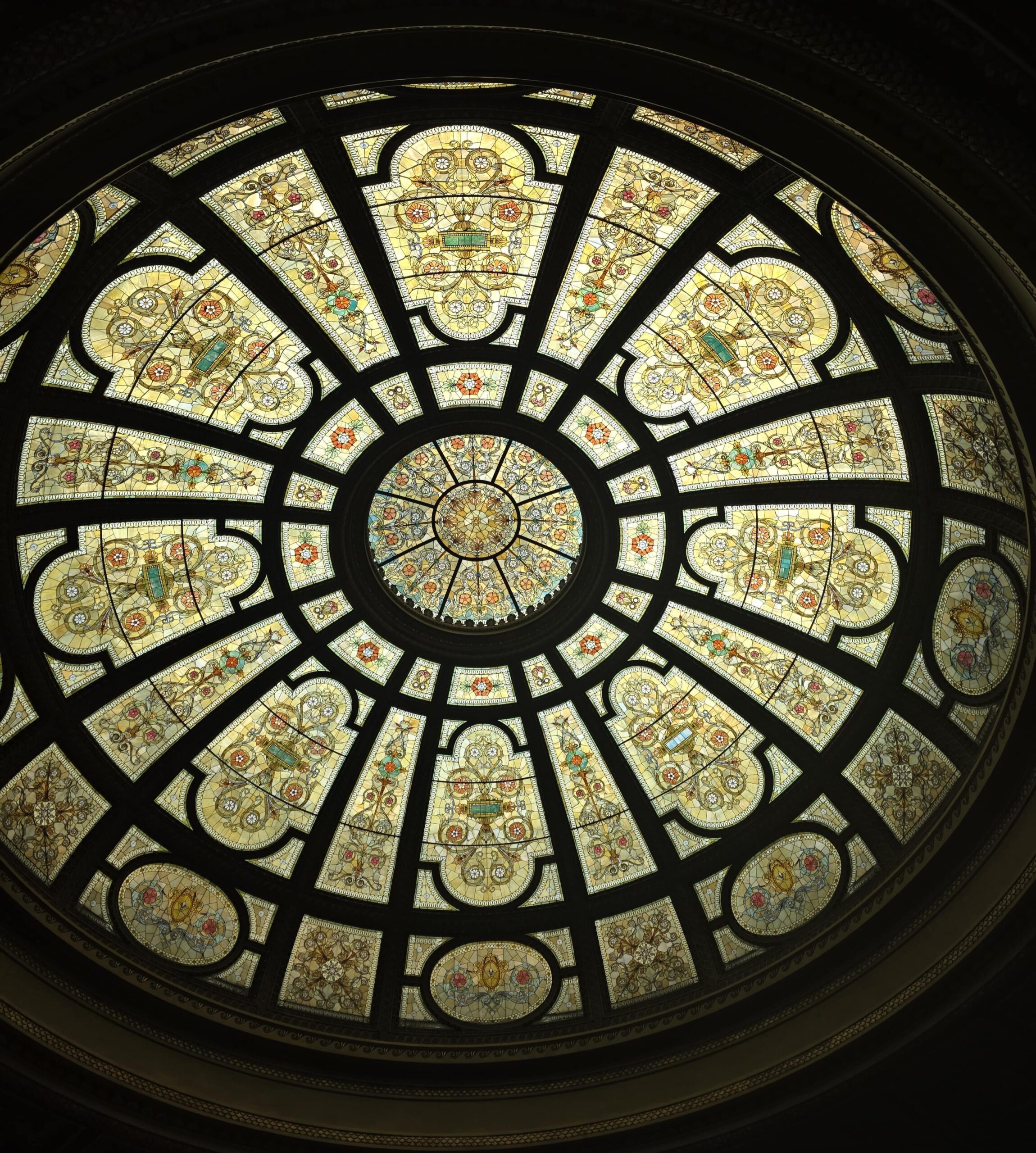 Chicago Cultural Center: Free Things to Do Near Millennium Park 3 The world’s largest Tiffany stained-glass dome glowing with light inside the Chicago Cultural Center.