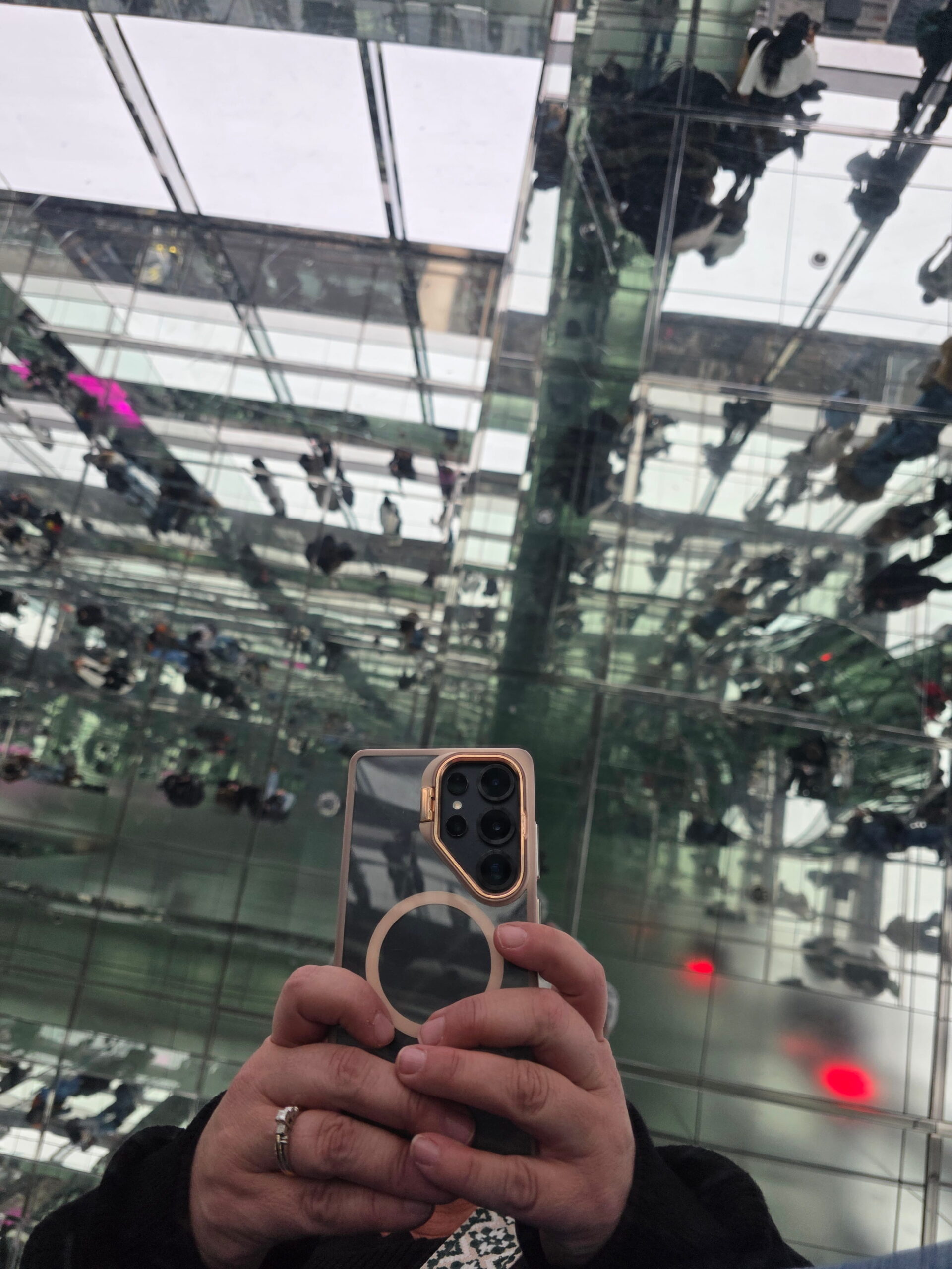 SUMMIT One Vanderbilt β the Best Observation Deck in NYC 4 One Vanderbilt The Summit Experience showing the view tourists get by laying on the floor looking up at all the glass and mirrors. Summit One Vanderbilt.